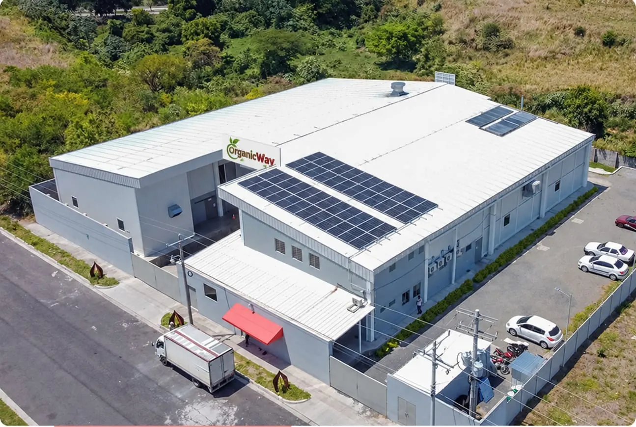 Illustration of an Organic Way facility with rooftop solar panels
